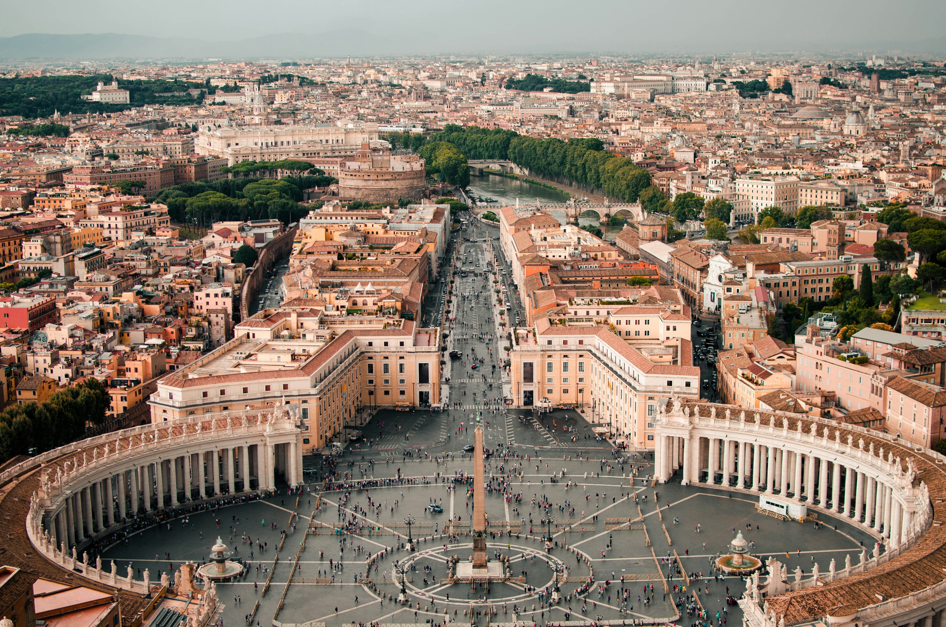 Colosseum Underground Tour Rome - St. Peter Basilica dome and colonnade square in Vatican City Rome at dawn